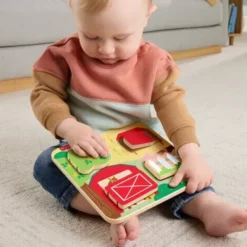 Fisher price puinen kurkistuslauta eläin