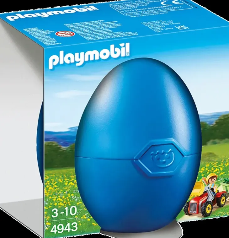 Playmobil poika lasten traktorilla